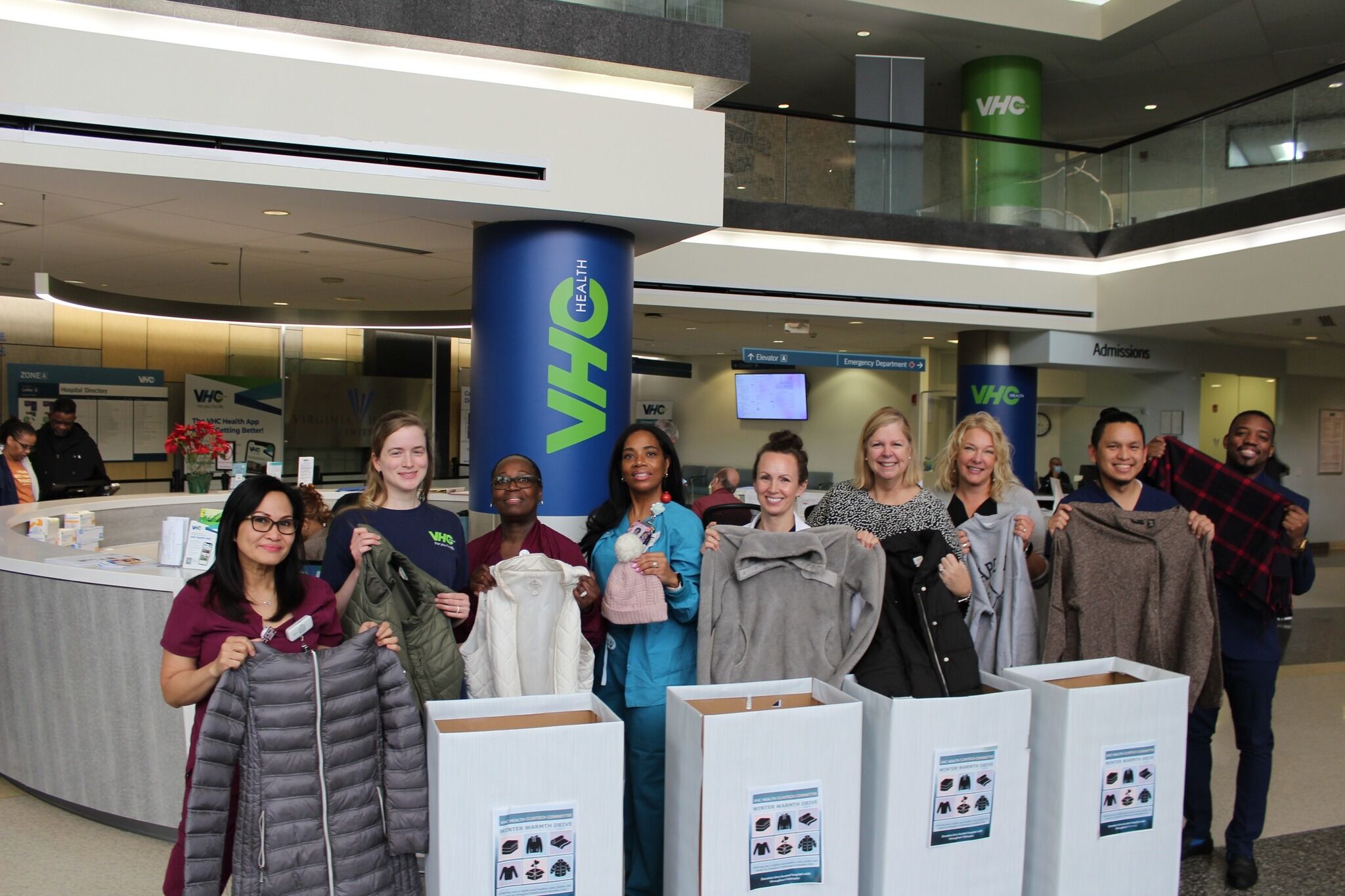 A group of VHC Health staff members volunteering with PathForward.